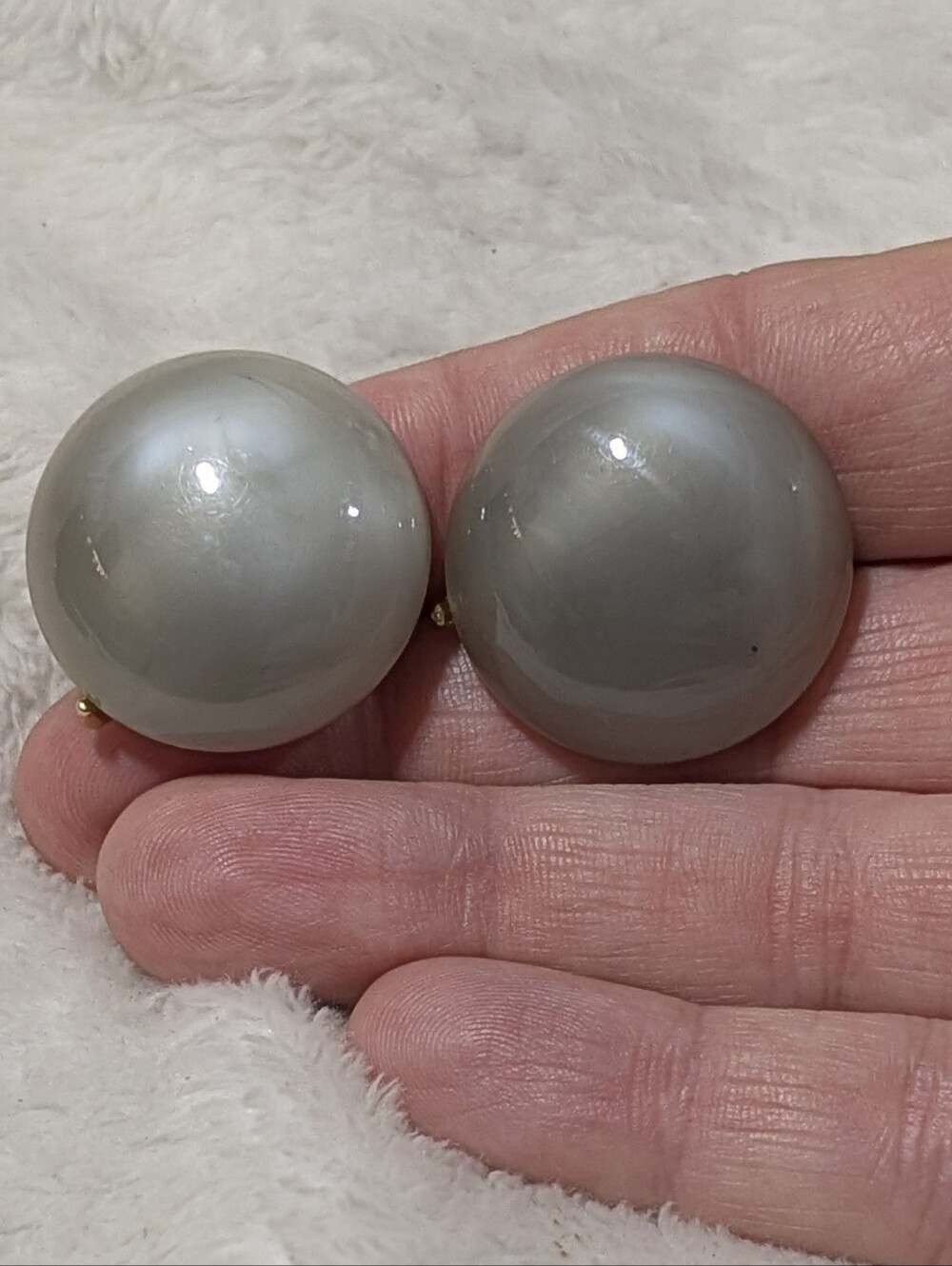 Vintage two-tone woven-style round button clip-on earrings.